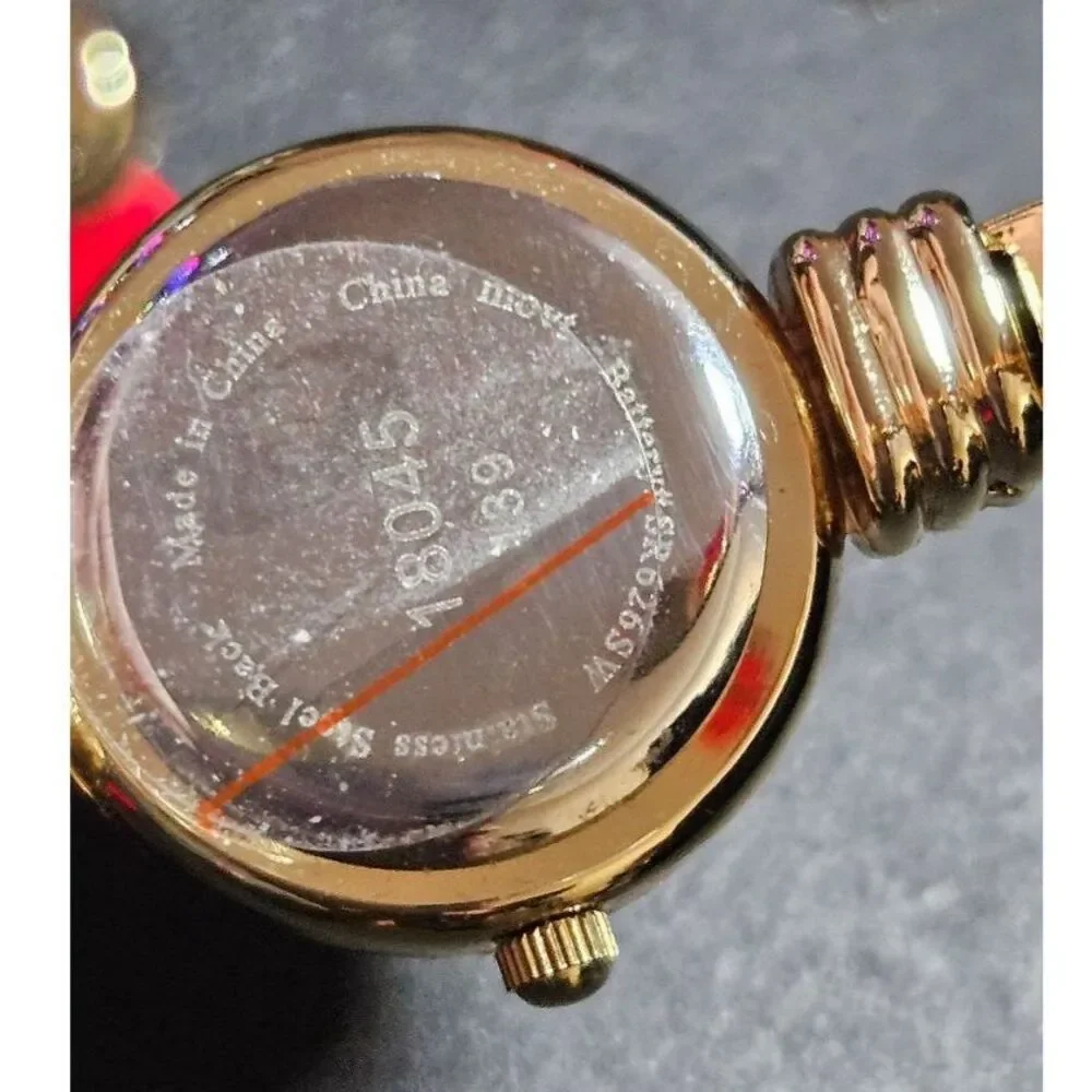Holiday Lane gold tone snowflake watch